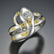 Other Rings 1-7: Platinum and 24k yellow gold snake with round clear and yellow diamonds