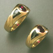 Other Rings 2-7: His and Hers rings with oval synthetic rubies and an inlay of Gneiss; a metamorphic rock over 2.4 billion years old