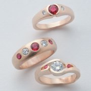 Other Rings 3-1: Three rings with rubies and diamonds in yellow gold