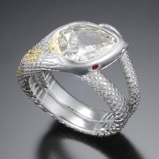 Other Rings 3-12: Pear shaped diamond as the head of the snake with ruby eyes set in platinum with yellow gold details