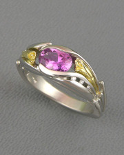 Other Rings 3-8: Oval pink sapphire set with small diamonds and Calla Lily details in platinum and yellow gold