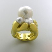 Other Rings 1-5: Octopus setting for a pearl in yellow gold