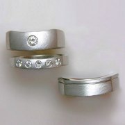 Bands 1-10: His and Hers engagement and wedding bands with round cut diamonds in platinum