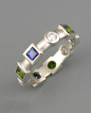 Bands 1-6: Princess cut blue and synthetic green sapphires with round cut diamonds in platinum