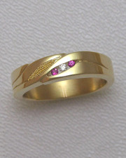 Bands 1-9: Small round rubies and diamond in 14karat yellow gold