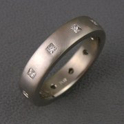 Bands 2-10: Princess cut diamonds flush set around a platinum band