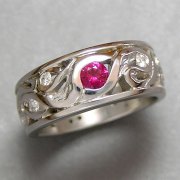 Bands 2-3: White gold band designed from an old family piece with a ruby and diamonds
