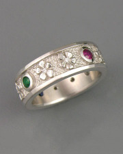 Bands 2-4: Small flowers with diamonds and bezel set stones in platinum