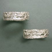 Bands 2-5: Juniper trees with a mountain background in white gold