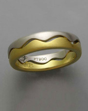 Bands 3-11: Open wave pattern in platinum and 18k yellow gold