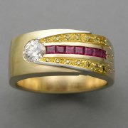 Bands 4-1: Round cut diamond with Princess cut rubies and small yellow diamonds in 14k yellow gold with 24k inlay