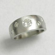 Bands 1-5: 14kt. white gold band with flush set round diamonds