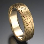 Mokeme Gane etched Classic pattern in 18kt. Yellow Gold and 14kt. Red Gold set in an 18kt. Yellow Gold lining, slightly domed band style
