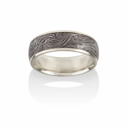 Damascus ring created from Limited ed. Circa 1870, Belgian made shotgun barrel cross section. 18k Yellow gold narrow rails and lining