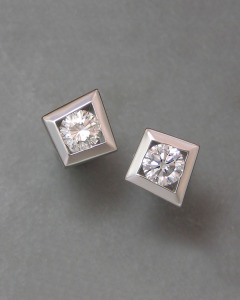 14kt. white gold kite shaped diamond stud earrings