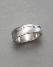 14k White gold line hammered band with off set recessed channel