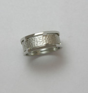 14k White gold band with geometric boarders and hammered center