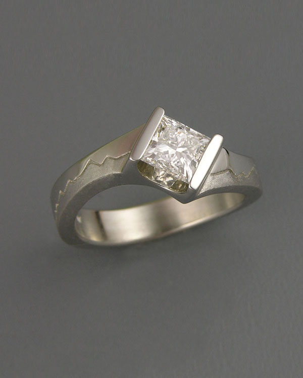 Mountain Engagement Rings 1-10: Platinum Skyline ring with a .70carat princess cut diamond in an off-set channel