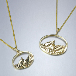14kt. yellow gold charm size and standard oval Flatirons pendants