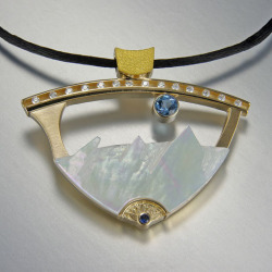 14kt. and 24kt. yellow gold mother-of- pearl flatirons pendant with sapphires and diamonds