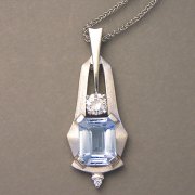 Necklace 1-4: Rectangular cut aquamarine with diamonds in white gold