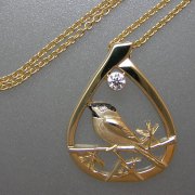 Necklace 2-12: Black Capped Chickadee with diamond in yellow gold