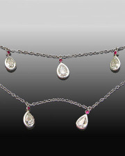 Necklace 3-8: Platinum necklace with pear shaped diamonds and small rubies set in full bezels