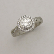14karat White gold Halo Engagement ring with side Diamonds