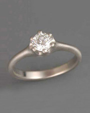 Engagement Ring 2-4: Round cut diamond prong set in white gold