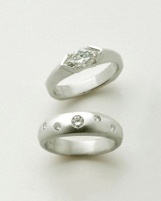 Engagement Ring 9-6: 14kt. white gold marquise diamond ring and 14kt. white gold band with flush set small diamonds
