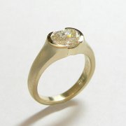 Engagement Ring 9-8: 14kt. yellow gold diamond engagement ring with partially bezel set Old Mine cut diamond