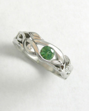 Engagement Ring 9-9: 14kt. white gold ring with organic vine details and a round tourmaline set in center