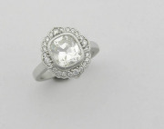 Cushion cut diamond engagement ring with vintage halo