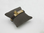 18k Yellow gold, Leather, Enamel _ Diamond Gambling Bracelet. Circa 1920